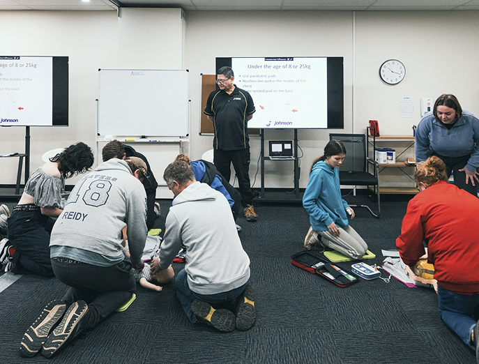 A practical class being led by a tutor at Johnson First Aid Training